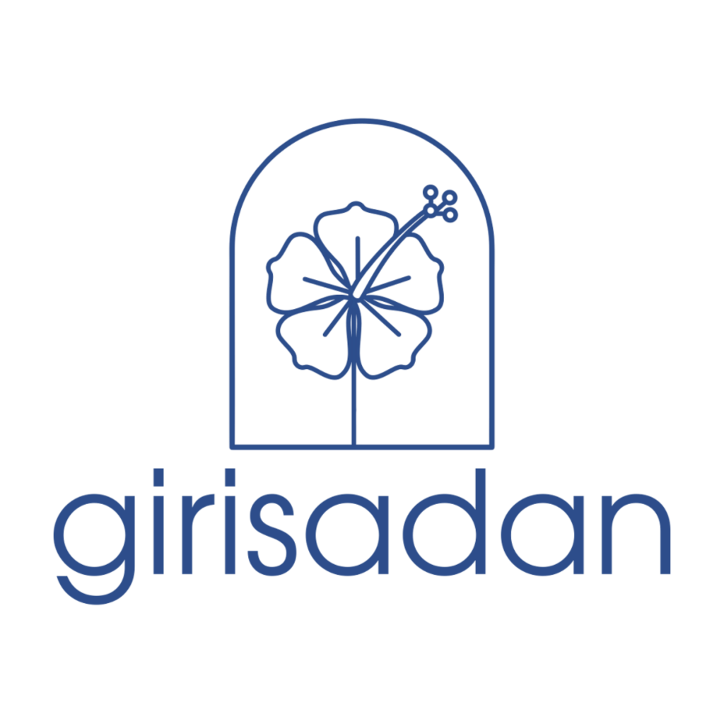 Girisadan Boutique Stays logo in blue